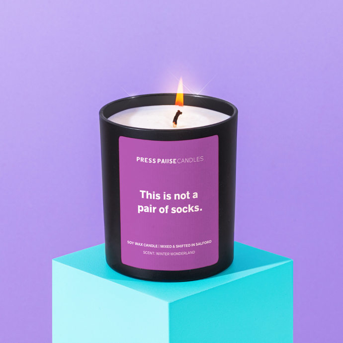 This is not a pair of socks | Large candle with deep purple label | Press Pause Candles