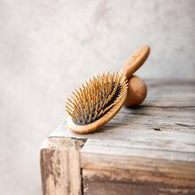 Load image into Gallery viewer, Bamboo Hairbrush on Black - Oval - Life Before Plastik
